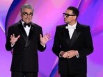 Hosts Eugene Levy and Dan Levy speak during the 76th Primetime Emmy Awards.