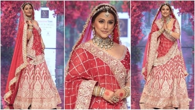 Hina Khan stuns as the showstopper at Times Fashion Week 2024, dazzling in an exquisite red bridal lehenga adorned with intricate golden sequin hand embroidery, exuding elegance and grace. (Instagram) Hina Khan stuns as the showstopper at Times Fashion Week 2024, dazzling in an exquisite red bridal lehenga adorned with intricate golden sequin hand embroidery, exuding elegance and grace. (Instagram)