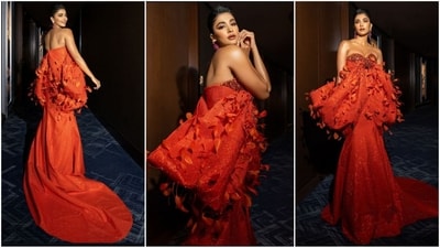 Pooja Hegde stuns in a vibrant orange feathered off-shoulder dress with a floor-sweeping hemline, effortlessly owning red-carpet fashion like a pro. (Instagram) Pooja Hegde stuns in a vibrant orange feathered off-shoulder dress with a floor-sweeping hemline, effortlessly owning red-carpet fashion like a pro. (Instagram)