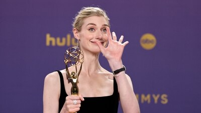 Elizabeth Debicki poses with the Outstanding Supporting Actress in a Drama Series for "The Crown" at the 76th Primetime Emmy Awards in Los Angeles. (REUTERS)