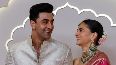 Actors Ranbir Kapoor and Alia Bhatt pose for pictures at the wedding of Anant Ambani and Radhika Merchant in Mumbai in July 2024. (File Photo/ REUTERS)