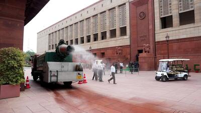 An 'anti-smog gun' sprays water at the Parliament House in June. (PTI) An 'anti-smog gun' sprays water at the Parliament House in June. (PTI)