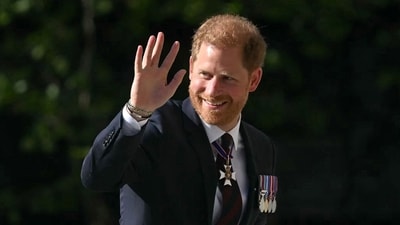 (FILES) Britain's Prince Harry, Duke of Sussex waves as he arrives to attend a ceremony marking the 10th anniversary of the Invictus Games, at St Paul's Cathedral in central London, on May 8, 2024. Prince Harry was once one of the British royal family's most popular members but as he celebrates his 40th birthday this weekend he is increasingly distanced from the UK public and his own family (Photo by JUSTIN TALLIS / AFP) (AFP)