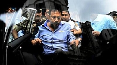 Former principal of RG Kar Medical College & Hospital Sandip Ghosh being taken to Alipur CBI Court in Kolkata on September 3. (Samir Jana/HT Photo) Former principal of RG Kar Medical College & Hospital Sandip Ghosh being taken to Alipur CBI Court in Kolkata on September 3. (Samir Jana/HT Photo)