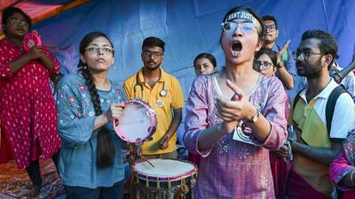 Junior doctors raise slogans during their ongoing protest against the R G Kar Medical College and Hospital incident in Kolkata on Monday. (PTI) Junior doctors raise slogans during their ongoing protest against the R G Kar Medical College and Hospital incident in Kolkata on Monday. (PTI)
