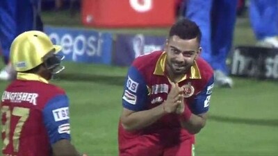 Virat Kohli bowed to Sarfaraz Khan during an IPL match. Virat Kohli bowed to Sarfaraz Khan during an IPL match.