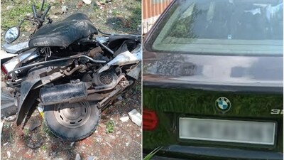 The scooter was badly damaged after being hit by a BMW in Indore. The scooter was badly damaged after being hit by a BMW in Indore.