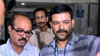 Kolkata: CBI officials take Tala Police Station Officer-in-Charge Abhijit Mondal (L) to produce him in a court after his arrest in connection with the R G Kar Medical College and Hospital incident at CGO Complex, in Kolkata, Sunday, Sept. 15, 2024. (PTI Photo) Kolkata: CBI officials take Tala Police Station Officer-in-Charge Abhijit Mondal (L) to produce him in a court after his arrest in connection with the R G Kar Medical College and Hospital incident at CGO Complex, in Kolkata, Sunday, Sept. 15, 2024. (PTI Photo)