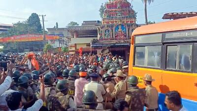 Police personnel deployed at the site where Vishwa Hindu Parishad and Bajrang Dal workers stage a protest over a social media post, in Mangaluru on Monday. (ANI) Police personnel deployed at the site where Vishwa Hindu Parishad and Bajrang Dal workers stage a protest over a social media post, in Mangaluru on Monday. (ANI)