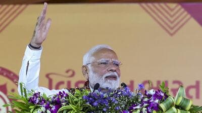 Prime Minister Narendra Modi addresses a public meeting in Ahmedabad on Monday. (PTI) Prime Minister Narendra Modi addresses a public meeting in Ahmedabad on Monday. (PTI)