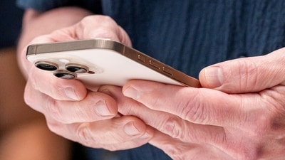 Tim Cook, CEO of Apple with the iPhone 16 Pro in Desert Titanium. (Bloomberg) Tim Cook, CEO of Apple with the iPhone 16 Pro in Desert Titanium. (Bloomberg)