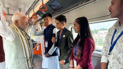 Prime Minister Narendra Modi travelled aboard the Ahmedabad metro after launching phase 2 of the Ahmedabad Metro Rail Projec (@narendramodi/X) Prime Minister Narendra Modi travelled aboard the Ahmedabad metro after launching phase 2 of the Ahmedabad Metro Rail Projec (@narendramodi/X)