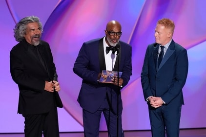 George Lopez, from left, Damon Wayans, and Jesse Tyler Ferguson present the award for outstanding lead actor in a comedy series. (Chris Pizzello/Invision/AP) George Lopez, from left, Damon Wayans, and Jesse Tyler Ferguson present the award for outstanding lead actor in a comedy series. (Chris Pizzello/Invision/AP)