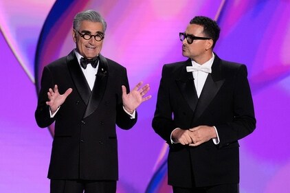 Hosts Eugene Levy and Dan Levy speak during the 76th Primetime Emmy Awards. (Chris Pizzello/Invision/AP) Hosts Eugene Levy and Dan Levy speak during the 76th Primetime Emmy Awards. (Chris Pizzello/Invision/AP)