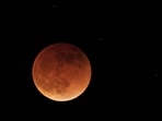 In 2024, a Super Harvest Moon lunar eclipse will occur, offering a partial view in many regions. 