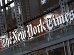 A sign for The New York Times hangs above the entrance to its building, Thursday, May 6, 2021 in New York. A sign for The New York Times hangs above the entrance to its building, Thursday, May 6, 2021 in New York.