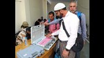 Kishtwar, Sep 17 (ANI): Polling officials collect their EVMs and other polling materials at a distribution centre before they leave for their respective polling stations on the eve of the first phase of Jammu and Kashmir Assembly polls, in Kishtwar on Tuesday. (ANI Photo) (Gourav)