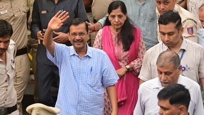 Arvind Kejriwal, along with his wife, on Sunday. (RAJ K RAJ /HT PHOTO)
