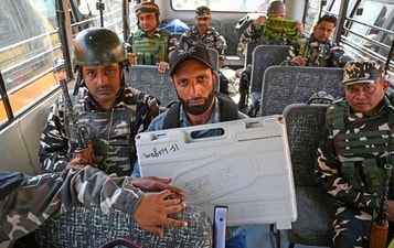 Polling official leaves with EVM for polling station ahead of the first phase of assembly election in Pulwama, 30 km from Srinagar (HT Photo/Waseem Andrabi) Polling official leaves with EVM for polling station ahead of the first phase of assembly election in Pulwama, 30 km from Srinagar (HT Photo/Waseem Andrabi)