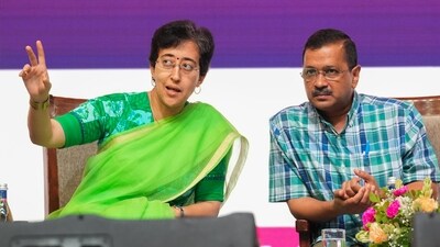 Arvind Kejriwal with Atishi during an event in Delhi. (PTI file photo) Arvind Kejriwal with Atishi during an event in Delhi. (PTI file photo)