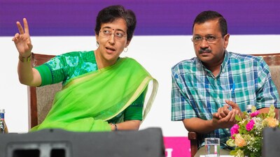 Arvind Kejriwal with Atishi during an event in Delhi. (PTI file photo) Arvind Kejriwal with Atishi during an event in Delhi. (PTI file photo)