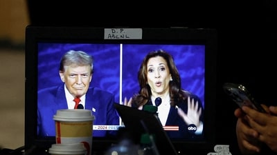 A member of the media uses phone as a screen displays the presidential debate, as Republican presidential nominee, former U.S. President Donald Trump and Democratic presidential nominee, U.S. Vice President Kamala Harris attend a presidential debate hosted by ABC in Philadelphia, Pennsylvania, U.S., September 10, 2024. REUTERS/Evelyn Hockstein (REUTERS)
