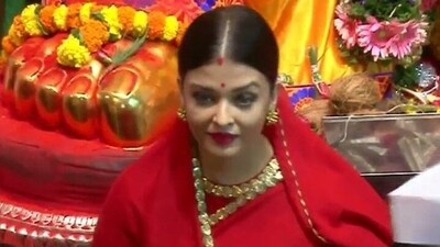 Aishwarya opted for a red Sabyasachi saree for the outing. Aishwarya opted for a red Sabyasachi saree for the outing.