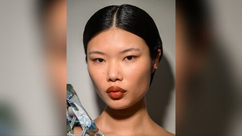 Sunset lips feature warm, gradient shades of orange, red, and pink, (Instagram) Sunset lips feature warm, gradient shades of orange, red, and pink, (Instagram)