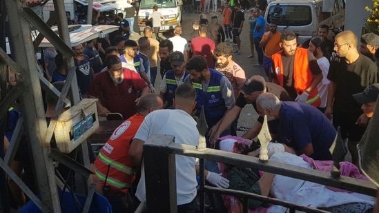 Civil Defense first-responders carry a man who was wounded after his handheld pager exploded, in the southern port city of Sidon, Lebanon, Tuesday, Sept. 17, 2024.(AP Photo) (AP)