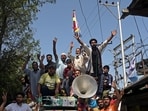 Supporters of Jamaat-e-Islami (JEI) party, shout slogans during a campaign rally ahead of the assembly elections, in Kulgam on September 15, 2024. (Photo by Tauseef MUSTAFA / AFP)