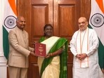 President Droupadi Murmu being presented a report on simultaneous elections in the country by former president Ram Nath Kovind who heads High-Level Committee (HLC) on 'One Nation, One Election', and Home Minister Amit Shah, at Rashtrapati Bhavan in New Delhi. President Droupadi Murmu being presented a report on simultaneous elections in the country by former president Ram Nath Kovind who heads High-Level Committee (HLC) on 'One Nation, One Election', and Home Minister Amit Shah, at Rashtrapati Bhavan in New Delhi.