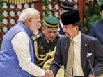 Prime Minister Narendra Modi with Sultan of Brunei Hassanal Bolkiah in Brunei on Wednesday. (PTI)
