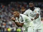 Real Madrid's French forward #09 Kylian Mbappe celebrates with Real Madrid's German defender #22 Antonio Ruediger after scoring his team's first goal during the UEFA Champions League 1st round day 1 football match between Real Madrid CF and Stuttgart VFB Real Madrid's French forward #09 Kylian Mbappe celebrates with Real Madrid's German defender #22 Antonio Ruediger after scoring his team's first goal during the UEFA Champions League 1st round day 1 football match between Real Madrid CF and Stuttgart VFB