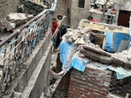 A portion of a house collapsed in New Delhi's Karol Bagh area on Wednesday. 