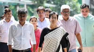 AAP leader Atishi is flanked by other party leaders after the legislative group elected her the next CM face. (Sanchit Khanna/HT Photo) AAP leader Atishi is flanked by other party leaders after the legislative group elected her the next CM face. (Sanchit Khanna/HT Photo)