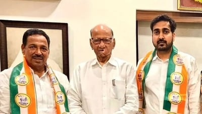 Bapusaheb Pathare (left) joined the NCP at Sharad Pawar's Mumbai residence. Pathare's son Surendra was also present. X Bapusaheb Pathare (left) joined the NCP at Sharad Pawar's Mumbai residence. Pathare's son Surendra was also present. X