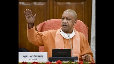 Chief minister Yogi Adityanath also flagged off hand-operated fogging machines and small vehicles given to all the 694 gram panchayats of Varanasi district for collecting dry and wet waste. (HT FILE)