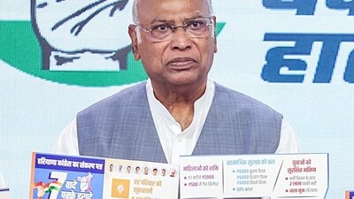 Congress president Mallikarjun Kharge releases the party's manifesto of seven guarantees for the Haryana elections on Wednesday. (AICC) Congress president Mallikarjun Kharge releases the party's manifesto of seven guarantees for the Haryana elections on Wednesday. (AICC)