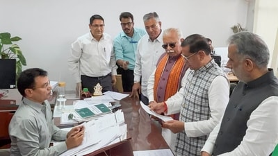 Faridabad: BJP candidate Rajesh Nagar files his nomination papers from Tigaon seat in presence of Union Ministers Manohar Lal and Krishnapal Gurjar, ahead of Haryana Assembly polls, in Faridabad, Monday, Sept. 9, 2024. (PTI) Faridabad: BJP candidate Rajesh Nagar files his nomination papers from Tigaon seat in presence of Union Ministers Manohar Lal and Krishnapal Gurjar, ahead of Haryana Assembly polls, in Faridabad, Monday, Sept. 9, 2024. (PTI)