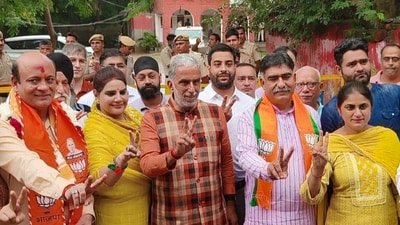 Faridabad: Union Minister of State Krishan Pal Gurjar with BJP candidate from Badkhal constituency Dhanesh Adlakha and others after his nomination filing for the upcoming Haryana Assembly elections, in Faridabad district, Thursday, Sept. 12, 2024. (PTI) Faridabad: Union Minister of State Krishan Pal Gurjar with BJP candidate from Badkhal constituency Dhanesh Adlakha and others after his nomination filing for the upcoming Haryana Assembly elections, in Faridabad district, Thursday, Sept. 12, 2024. (PTI)