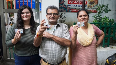Kashmiri migrants present their identification cards at a special polling booth in New Delhi for the first phase of Jammu and Kashmir assembly elections. (PTI) Kashmiri migrants present their identification cards at a special polling booth in New Delhi for the first phase of Jammu and Kashmir assembly elections. (PTI)