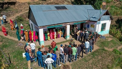 People queue to vote at a polling station in Doda district during the first phase of Jammu and Kashmir Assembly elections. (PTI) People queue to vote at a polling station in Doda district during the first phase of Jammu and Kashmir Assembly elections. (PTI)