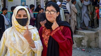 Voters in Anantnag district show their ink-marked fingers after voting in the first phase of the Jammu and Kashmir Assembly elections. (PTI) Voters in Anantnag district show their ink-marked fingers after voting in the first phase of the Jammu and Kashmir Assembly elections. (PTI)