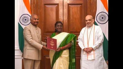 President Droupadi Murmu being presented a report on simultaneous elections in the country by former president Ram Nath Kovind who heads High-Level Committee (HLC) on 'One Nation, One Election', and Home Minister Amit Shah, at Rashtrapati Bhavan in New Delhi. (PTI Photo) (PTI) President Droupadi Murmu being presented a report on simultaneous elections in the country by former president Ram Nath Kovind who heads High-Level Committee (HLC) on 'One Nation, One Election', and Home Minister Amit Shah, at Rashtrapati Bhavan in New Delhi. (PTI Photo) (PTI)