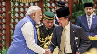 Prime Minister Narendra Modi with Sultan of Brunei Hassanal Bolkiah in Brunei on Wednesday. (PTI) Prime Minister Narendra Modi with Sultan of Brunei Hassanal Bolkiah in Brunei on Wednesday. (PTI)
