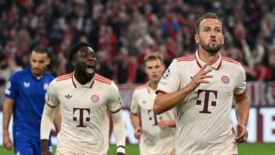 Bayern Munich's Harry Kane celebrates scoring their fourth goal with Alphonso Davies (REUTERS)