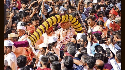 The traditional procession, which began at 10.15 am on Tuesday from Belbaug Chowk, concluded at Alka Talkies Chowk by 3 pm on Wednesday, before heading to the riverbanks for immersion. (MAHENDRA KOLHE/ HT PHOTO) The traditional procession, which began at 10.15 am on Tuesday from Belbaug Chowk, concluded at Alka Talkies Chowk by 3 pm on Wednesday, before heading to the riverbanks for immersion. (MAHENDRA KOLHE/ HT PHOTO)