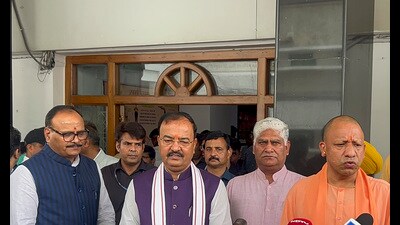Uttar Pradesh chief minister Yogi Adityanath with his deputies Brajesh Pathak and Keshav Prasad Maurya (PTI File) Uttar Pradesh chief minister Yogi Adityanath with his deputies Brajesh Pathak and Keshav Prasad Maurya (PTI File)