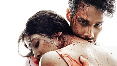 Malavika Mohanan and Siddhant Chaturvedi in a still from Yudhra. Malavika Mohanan and Siddhant Chaturvedi in a still from Yudhra.