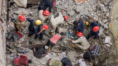 Rescue work underway after a two-storey house collapsed in Bapa Nagar area of Karol Bagh, in New Delhi, Wednesday, Sept. 18, 2024. (PTI) Rescue work underway after a two-storey house collapsed in Bapa Nagar area of Karol Bagh, in New Delhi, Wednesday, Sept. 18, 2024. (PTI)